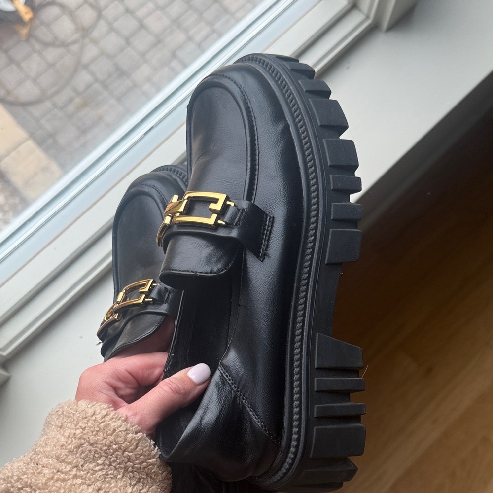 Black Loafers with Gold Accent